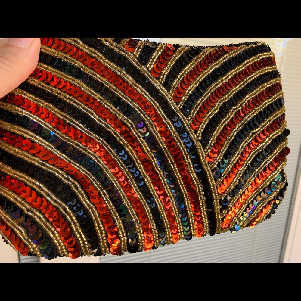 Black, gold, burnt orange sequin clutch